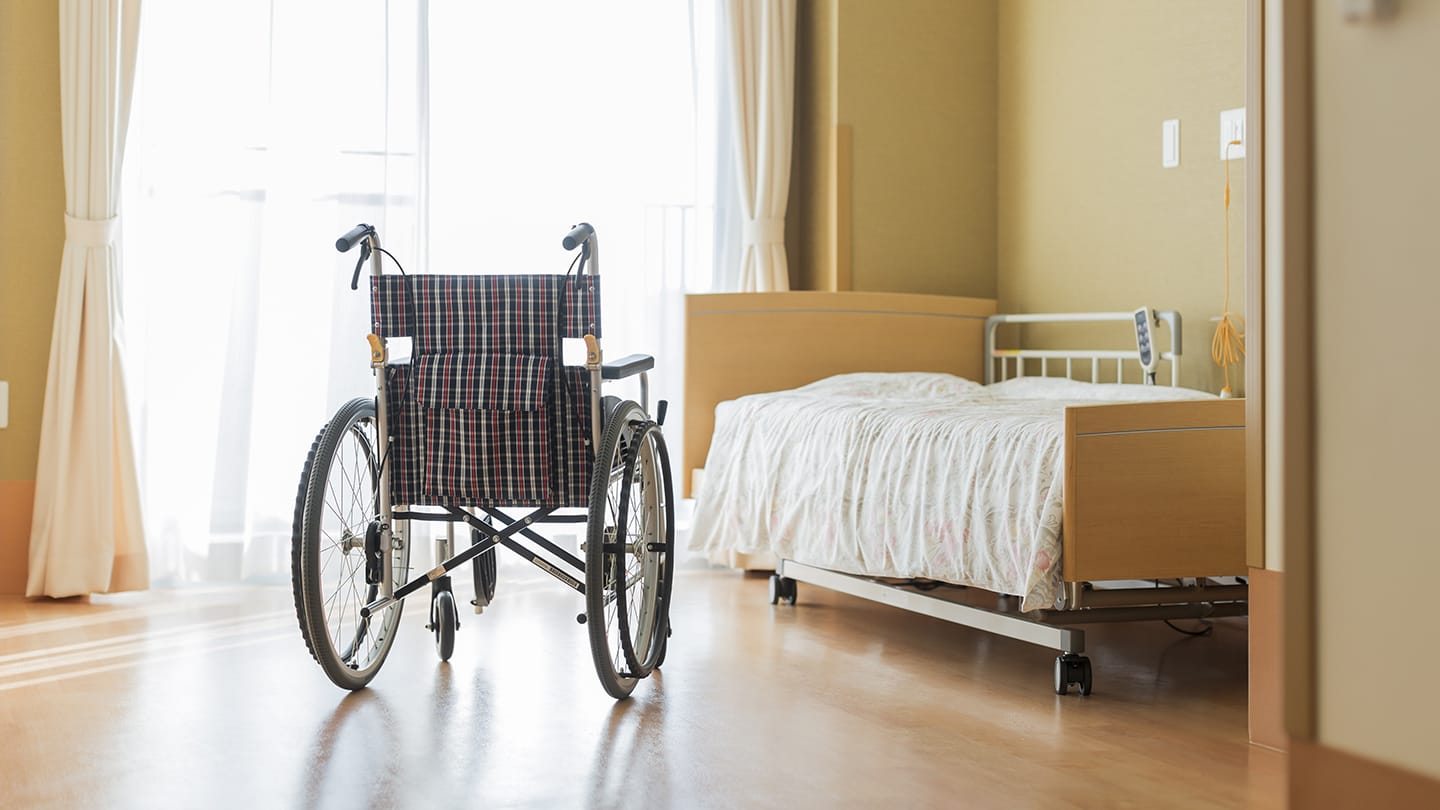 Wheel chair in nursing home room